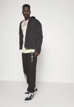 YOURTURN Unisex - Tracksuit Bottoms - Black -Yourturn Sales Store 8a31f87079cd4712bb3d30b299f2c3b9